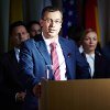 Politician giving a speech at a podium